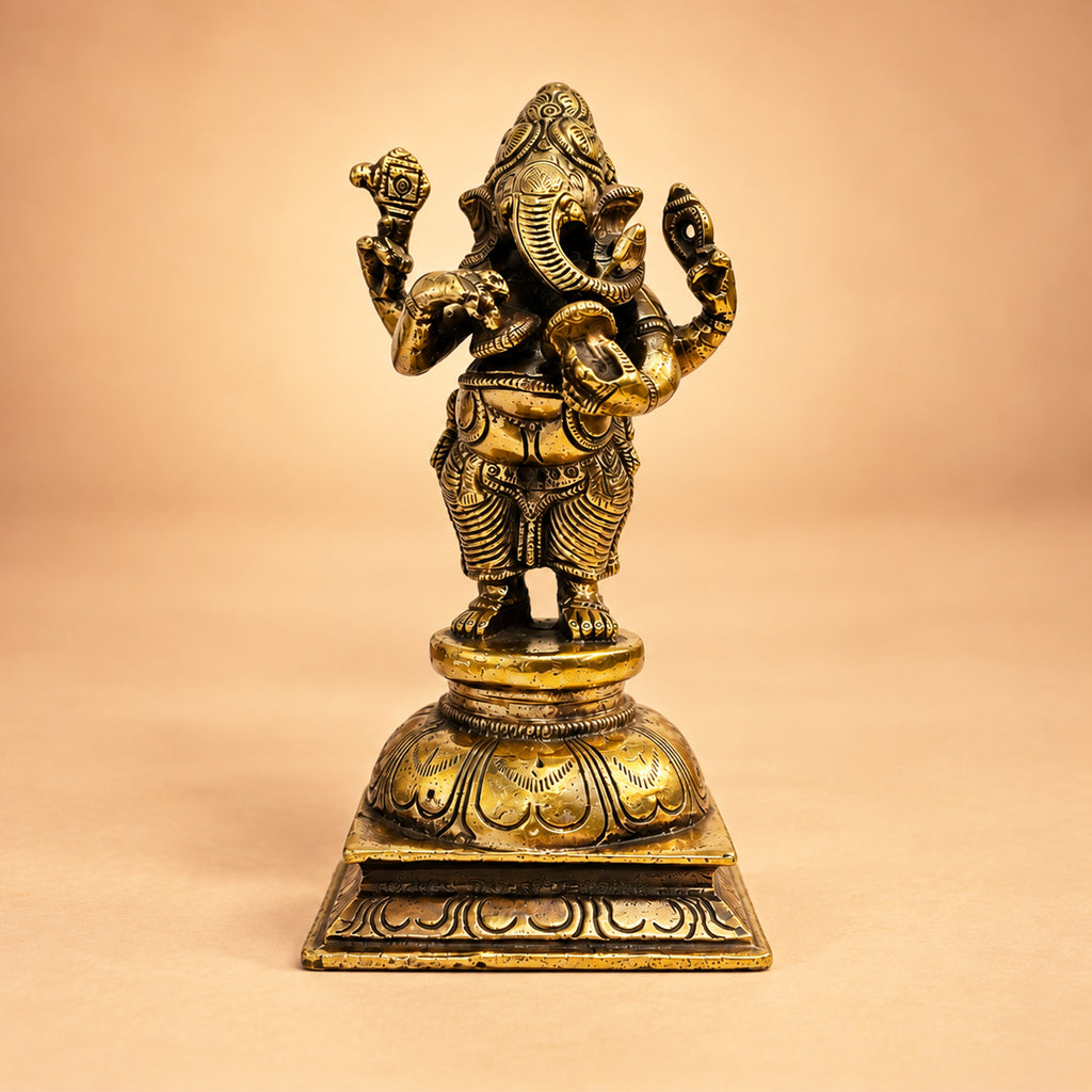 Front view of the golden-finish Brass Standing Ganesha idol