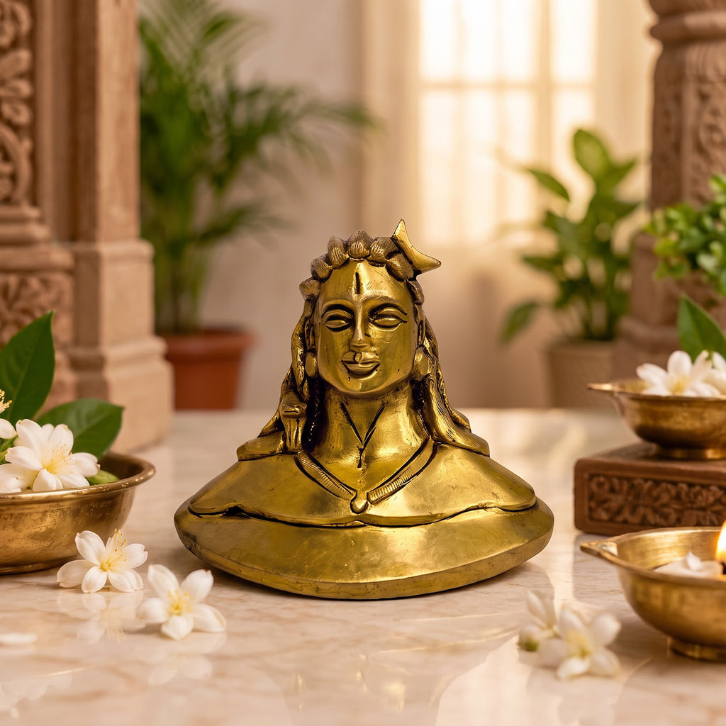 Brass Adiyogi idol displayed in a home temple