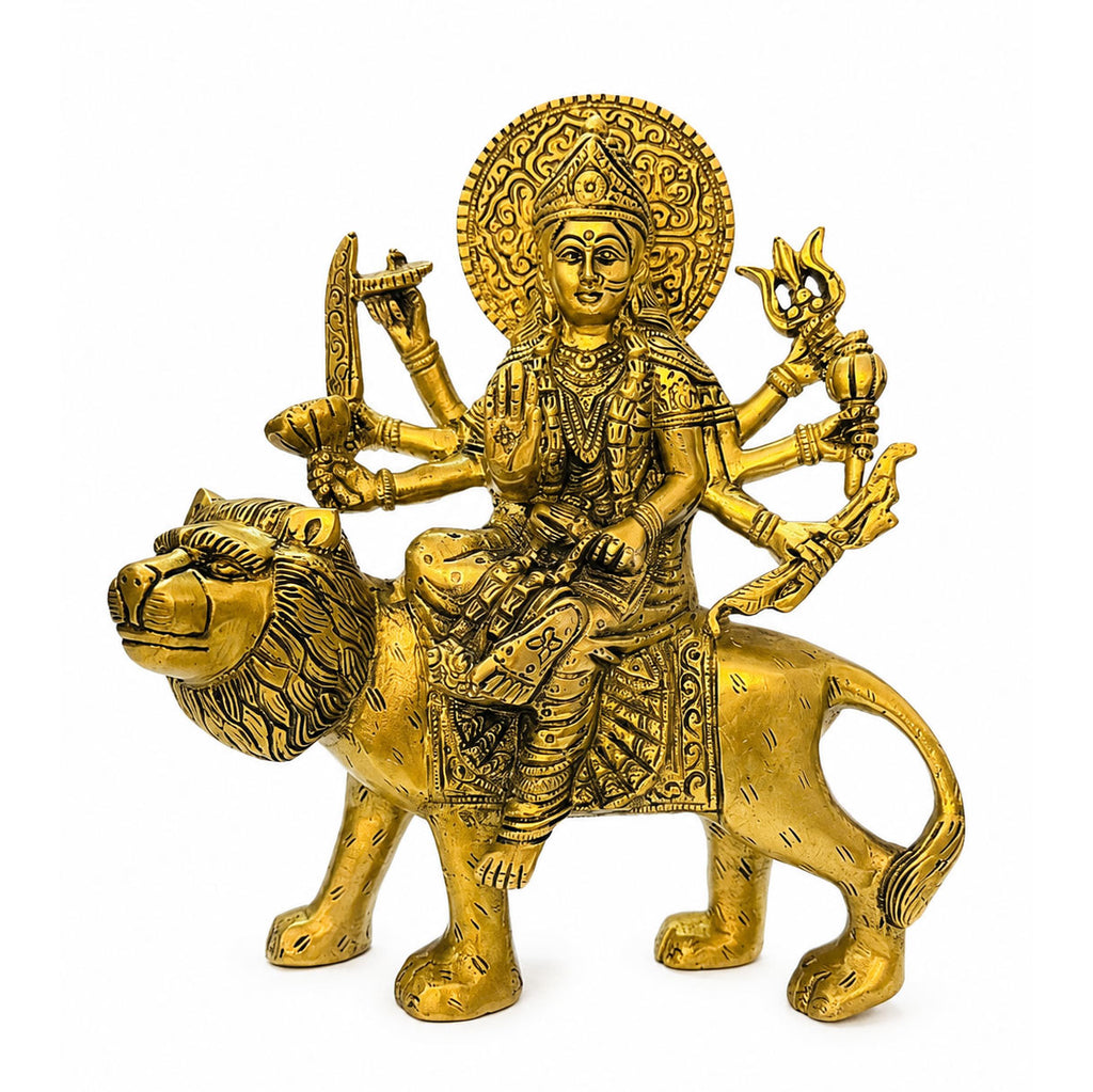 Brass Durga Ji Sitting on Lion - lifestyle shot with diya