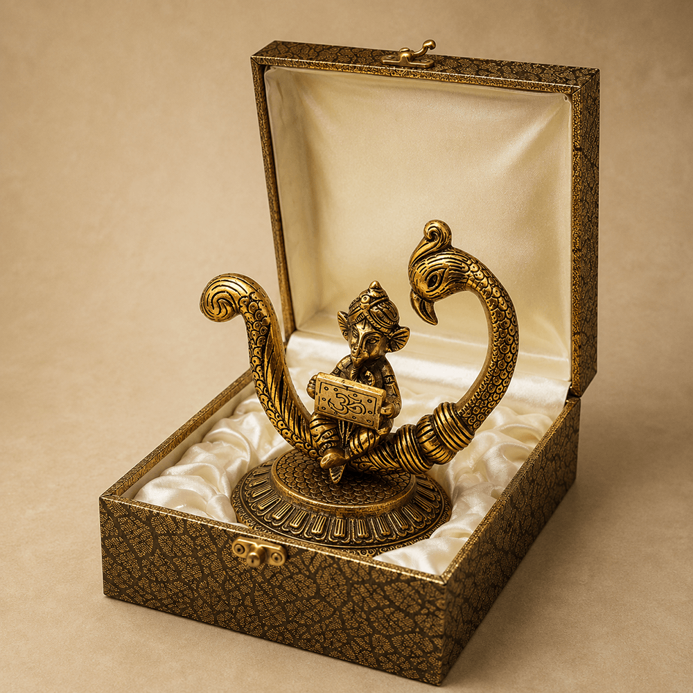 Metal Lord Ganesha figurine held in hand - size reference