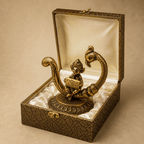 Metal Lord Ganesha figurine held in hand - size reference