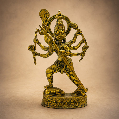 Brass Kali Mata Idol with 8 Arms - temple setting with diyas