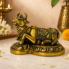 Nandi Ji Brass Idol – lifestyle shot with diyas and flowers