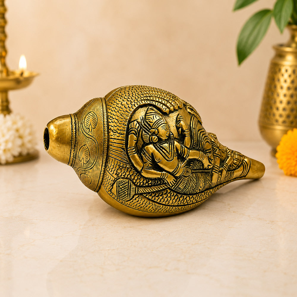 Vishnu Lakshmi Brass Shankh – lifestyle shot being blown during puja