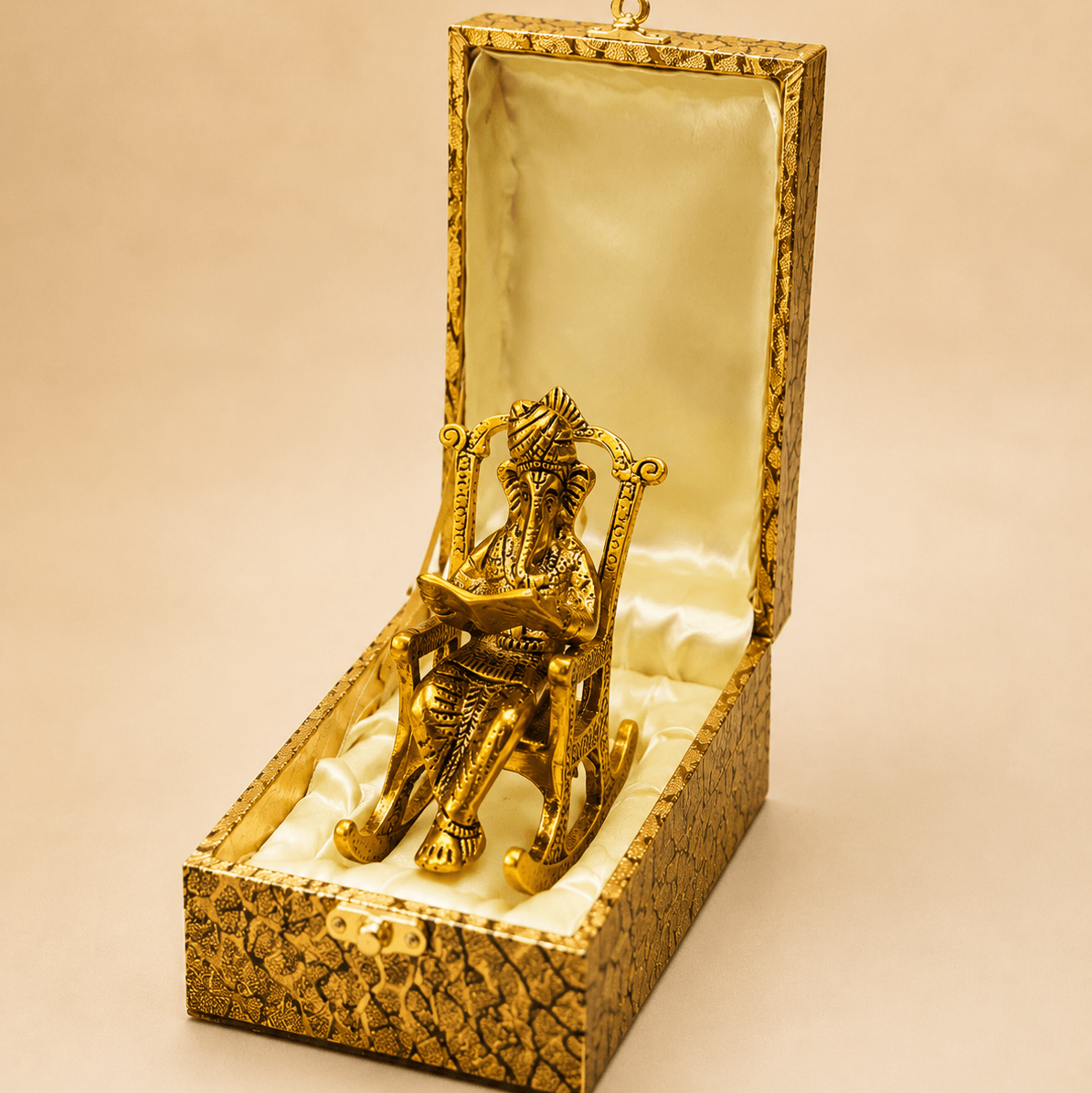 Ganesha Rocking Chair Idol in Premium Gold Brocade Gift Box