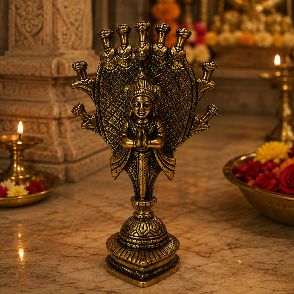 Brass Seshnag Diya – dimensions front and side view showing 8.6cm width, 13.8cm height, 14.2cm depth, 453g weight