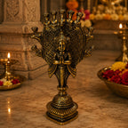 Brass Seshnag Diya – dimensions front and side view showing 8.6cm width, 13.8cm height, 14.2cm depth, 453g weight
